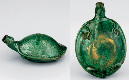 The vivid green Salem turtle bottle from about 1800‱820 was made from life. The back of the turtle is decorated with a foliate design with crosshatching and the underside of the animal form is detailed with feet and the tail.