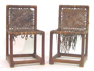 A pair of 1924 Wharton Esherick chairs with damaged seats went out at $13,225.