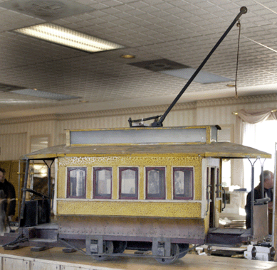 A surprise of the auction was this folky metal trolley in yellow paint, turn of the century, that surpassed its conservative $600/800 estimate to bring $4,025.