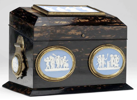 A writing desk in calamander wood veneer with brass and blue jasper mounts demonstrates the popular incorporation of Wedgwood ornamentation into the products of other manufacturers. This box was made around 1860 by Toulmin and Gale of London.