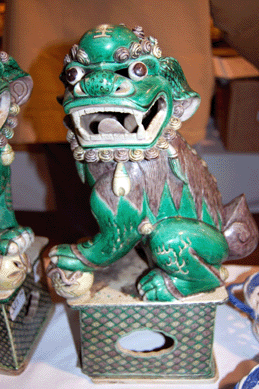 A pair of green ceramic foo dogs (one shown) sold for $1,380.