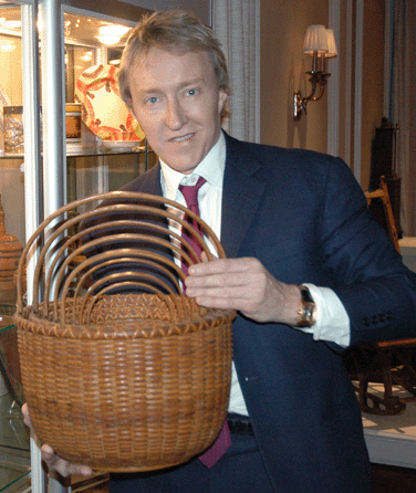 Leigh Keno shows off the Nantucket baskets.