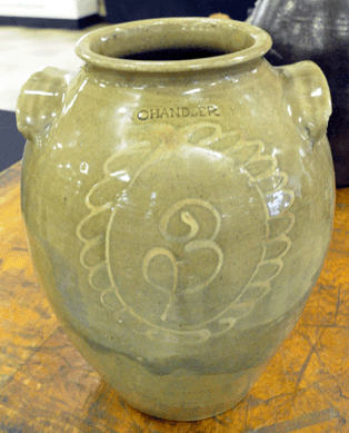 The 3-gallon jar in an alkaline glaze with a large "3†in slip surrounded by a floral decoration, impressed Chandler, sold for $6,613.  