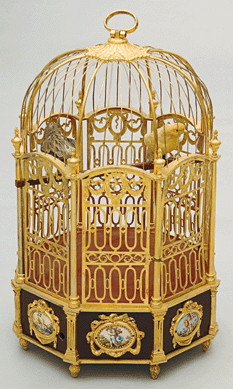 Bird cage clock, gilded bronze, enamels and porcelain. San Lorenzo de El Escorial, Royal Palace, National Heritage.