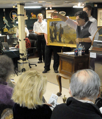 Auctioneer Kaja Veilleux works the crowd as the Iacovleff painting was selling.