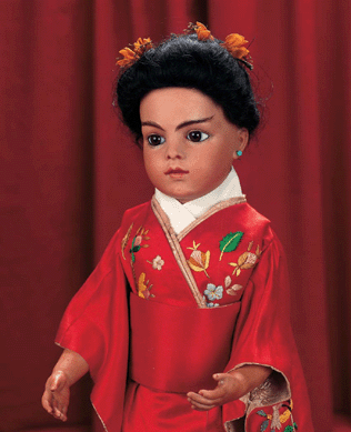 Leon Casimir Bru's Asian model is extremely rare, especially with uniquely painted brows and complexion that match her bisque hands. Wearing a rich red silk Chinese wedding costume, the doll was a crowd-pleaser, selling for $52,500.
