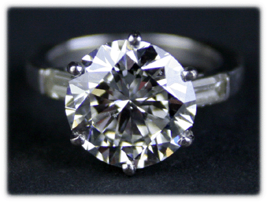 This GIA-certified round brilliant-cut diamond engagement ring exceeding 5 carats realized a little less than $65,000.