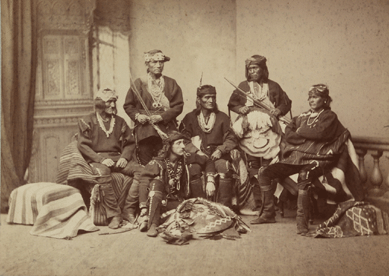 One of the most colorful yet serious scientists of the West, anthropologist Frank Hamilton Cushing (1857‱900), lived for five years with the Zuni Indians, gathering observations for the Bureau of American Ethnology. He is pictured, seated center, with a delegation of Zunis. Later, dressed in Zuni garb, Cushing posed for a famous full-length portrait by painter Thomas Eakins. Photo by James Wallace Black, 1882. National Portrait Gallery.