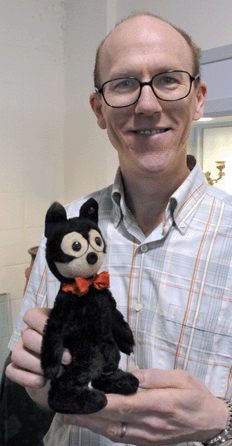 Auction house principal Jack DeStories with the rare Steiff stuffed Felix The Cat that sold for $4,887.