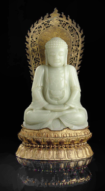 A rare large white jade figure of Buddha, Eighteenth/Nineteenth Century, finished at $2,322,500.