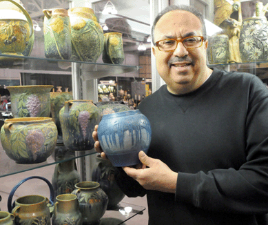Arnie Small with a pottery vase from Barbara Gerr Antiques, Galloway, N.J.