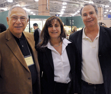 Promoters Jessie Kohler (far left) and Allison Kohler with floor manager Larry Ross.