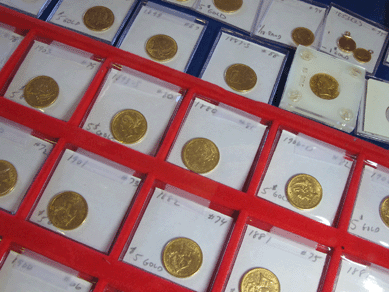 A collection of approximately 60 gold coins, offered individually, grossed more than $28,750, and came in denominations of $2½, $5 and $20.