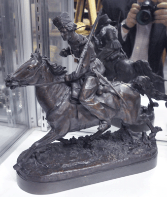 The bronze of a Russian Cossack signed "Lanceray†went out at $11,750.