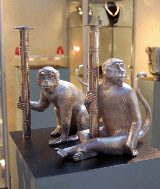 Alastair Crawford of Fairfield, Conn., specializes in Georg Jensen silver, but the 12-inch monkey candlesticks are his own design, made by a London silversmith.