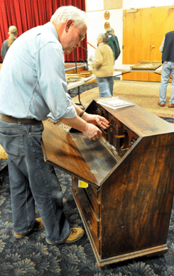 A shell carved Newport desk that was missing its base realized $12,350.