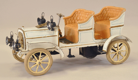 This rare circa 1903 German Marklin tinplate four-seat tourer, 13 inches, clockwork, is known to have been one of Donald Kaufman's most highly prized acquisitions. It made $55,200.