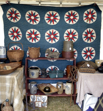 A mariner's compass quilt came out of a sea captain's home in Maine to drydock on the fields at Brimfield in the booth of Tisdale And Calhoun, Essex and Higganum, Conn. ⁊&J