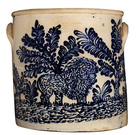 A 6-gallon crock elaborately decorated with the heavily detailed scene of a lion standing in a jungle. William E. Warner, West Troy, N.Y.