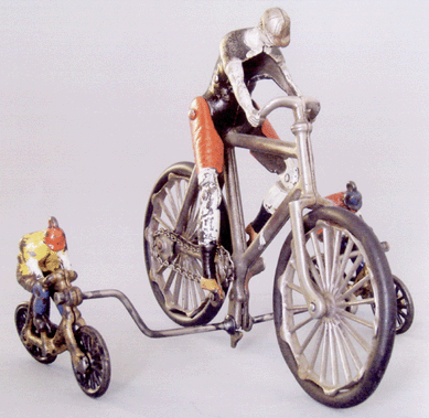 One of two known cast iron toys, "Ideal Bicycle Riders,†circa 1895, in excellent condition, brought $15,275.