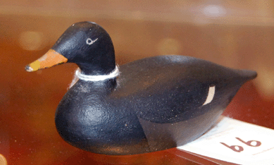 The miniature Scoter decoy carved by Joe Lincoln of Hingham, Mass., sold for $3,803.