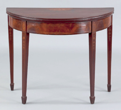 A Baltimore Hepplewhite mahogany card table, circa 1795, took $14,040.