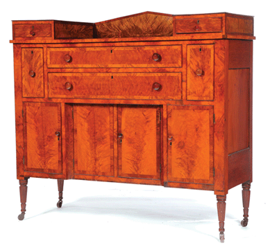 A figured cherry Sheraton sideboard believed to be from Cincinnati, Ohio, was dated November 13, 1822 and realized $9,400. 