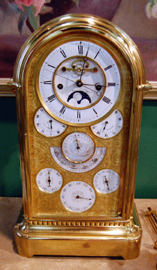 A French astrological mantel clock with dials for the phases of the moon, the astrological signs, days of the week and months and sunrise and sunset realized $28,750.