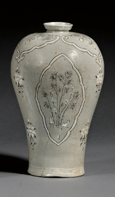 Korean The Thirteenth Century Korean Koryo stoneware vase in a celadon glaze with black and white sangam inlay brought $59,250. 