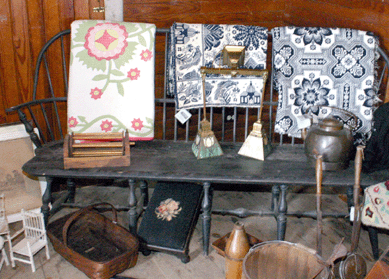 A trio of colorful textiles was seen at Denise Jensen's Mainely Americana Antiques, Den-mark, Maine.