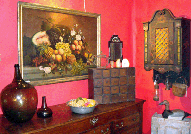 Accessories often complete the decor. Shown here is a selection of early antiques to finish the picture.