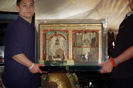 The late Nineteenth Century Turkish diorama depicting a deceased sultan in his coffin attended by mourners with whirling Dervishes and other court figures in mourning ceremonies attained $19,550. 