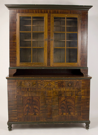 This Pennsylvania paint decorated Dutch cupboard was the auction's top lot, selling for $17,250.