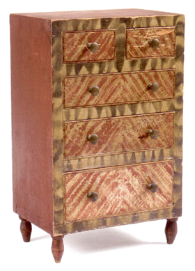 An early Pennsylvania smoke decorated and fancy painted spice chest, 18½ inches tall, 11½ inches wide and 8 inches deep, exceeded the high estimate of $25,000, realizing $46,660.