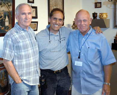 Manager Frank Gaglio is flanked by Ohio dealers Samuel Forsythe, left, and David Good.