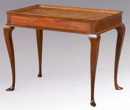From the collection of David Brooks Gendron was this Newport, R.I., carved mahogany rectangular tray-top tea table, Townsend-Goddard School, circa 1745‱755, set on square cabriole legs ending in slipper feet. The provenance lists Israel Sack, Inc, New York, and the high estimate was $80,000. It brought $99,120.