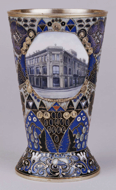 Fabergé presentation vase, workmaster Feodor Rückert, circa 1912. Gilded silver and cloisonné enamel vase in the Old Russian style, decorated on one side with a view of Fabergé's Moscow branch and on the other with an inscription commemorating 25 years of the Moscow branch and the association of Carl Fabergé and Feodor Rückert. 