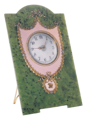 Twenty-fifth anniversary clock by Fabergé, workmaster Henrik Wigström, St Petersburg, circa 1910. Gold, gilded silver, enamel and nephrite clock, set with diamonds and seed pearls. 