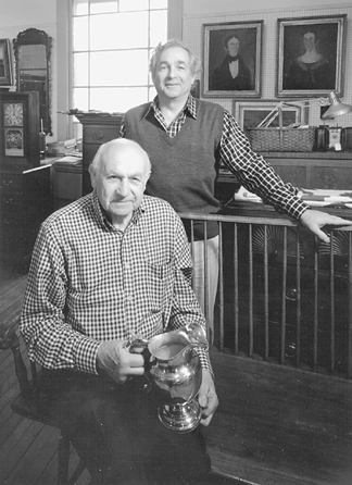 The strong family relationship between father and son is reflected in this 1988 photograph.