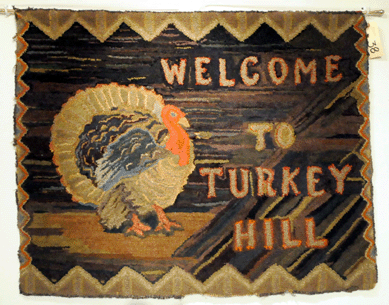 The hooked rug with a large turkey in the center brought $9,200.