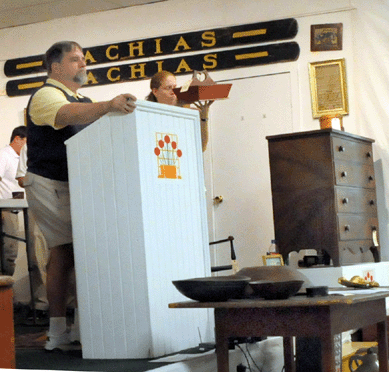 Auctioneer Tim Gould looks for bids.