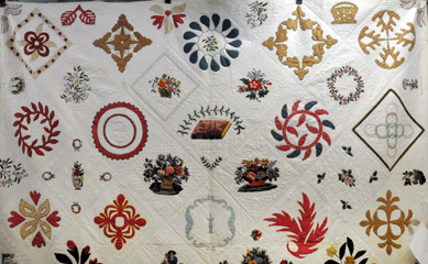 The Maine state quilt sold for $6,325. It was underbid by Laurie LeBar of the Maine State Museum.