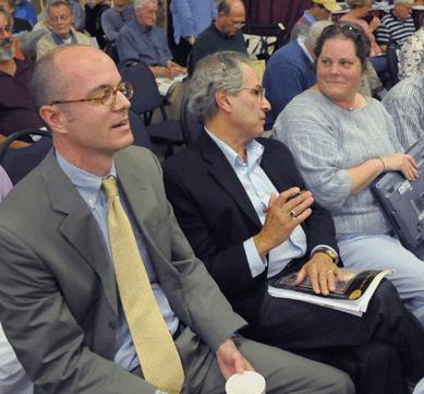 The consortium of bidders representing the Maine institutions that bought the collection of silk merchants banners included Thomas Denenberg of the Portland Museum of Art, left; Richard D'Abate, executive director of the Maine Historical Society; and Laurie LeBar of the Maine State Museum.