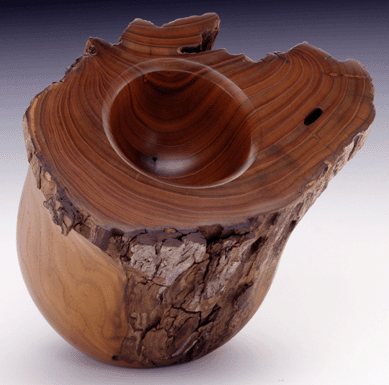 A leader in the field as well as a fine artist, Robyn Horn contrasts lathe-turned sections with irregularities of the wood, here, smokewood, in "Geode #231,†1988. By carefully manipulating the wood, Horn achieves an admirable balance between machine precision and rough-textured surface.