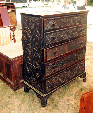 A carved Victorian blanket chest had Chippendale touches and sold for $575.