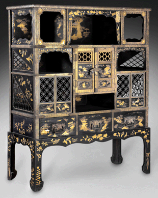 One of a pair of cabinets of lacquered and gilt wood. Each panel or other flat surface is decorated with a mountainous landscape with figures.