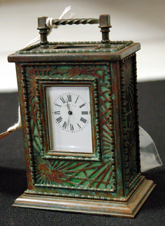 This Tiffany Studios Pinecone carriage clock was the top lot of the sale, realizing $4,025 from a phone bidder.