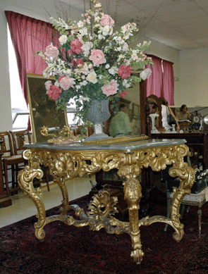 Eighteenth⁎ineteenth Century carved giltwood marble top console, 70 by 29 by 38 inches, sold for $1,150.