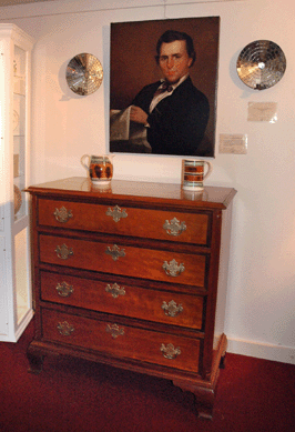 Joy Ruskin Hanes and Lee Hanes of Hanes & Ruskin, Old Lyme, Conn., did some sleuthing from clues painted into the portrait shown over the Chippendale dresser and discovered that the sitter was James M. Scofield, editor and publisher of the New London Morning Star, which was published from 1846 to 1847.