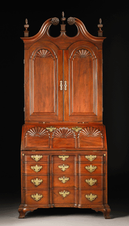 The top lot of the sale, property of an overseas collector, was the Corlis-Bowen family Chippendale block and shell carved and figured mahogany desk and bookcase, attributed to the shop of John Carlisle Sr, Providence, R.I. It dates circa 1770 and appears to retain the original cast brass hardware and finials. Estimated at $800,000․2 million, it sold for $962,500.